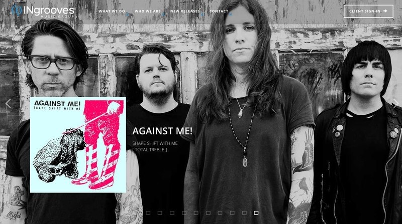 A picture of the band Against Me (with lead singer Laura Jane Grace at the front) with an image of there newest album in the lower left corner. The INgrooves logo is in the top left corner.